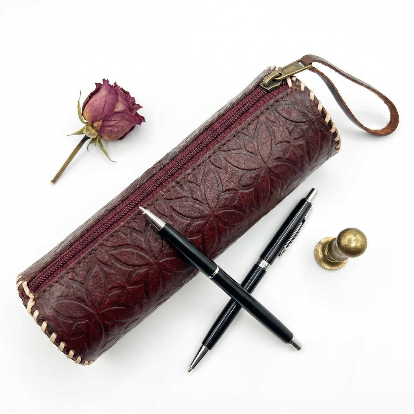 RAQZ Petal Barrel Pouch — hand-stamped horse leather from Rajasthan, front view
