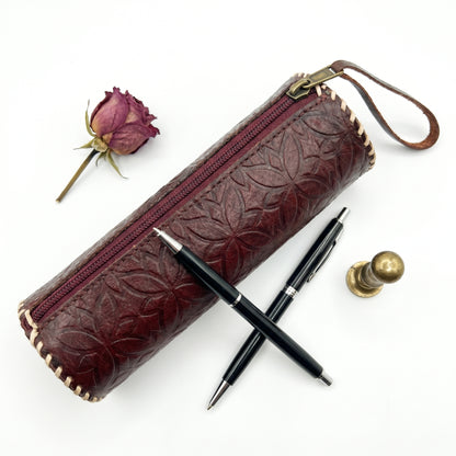 RAQZ Petal Barrel Pouch — hand-stamped horse leather from Rajasthan, front view