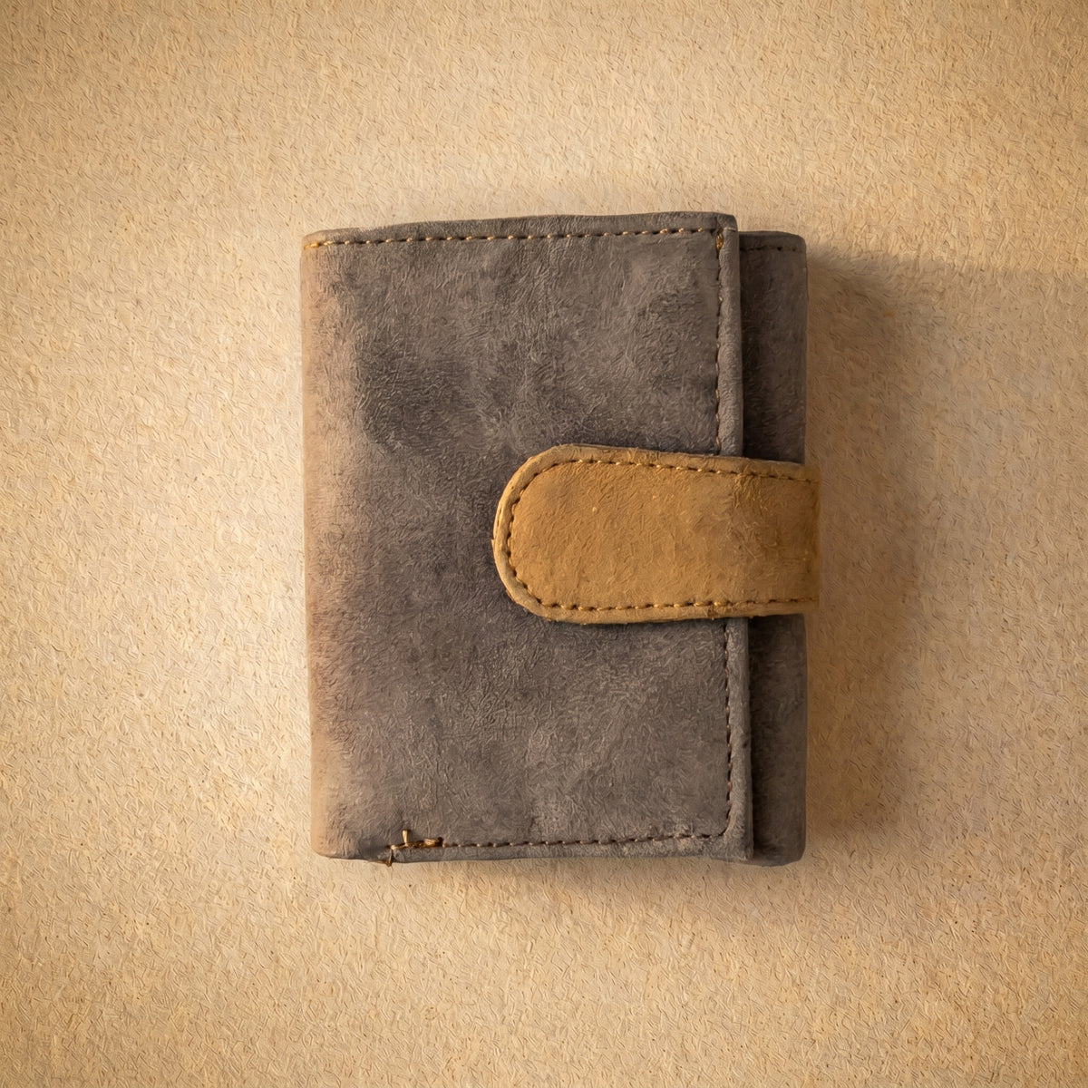 RAQZ Grey Trifold Wallet — handcrafted suede leather from Rajasthan, front view