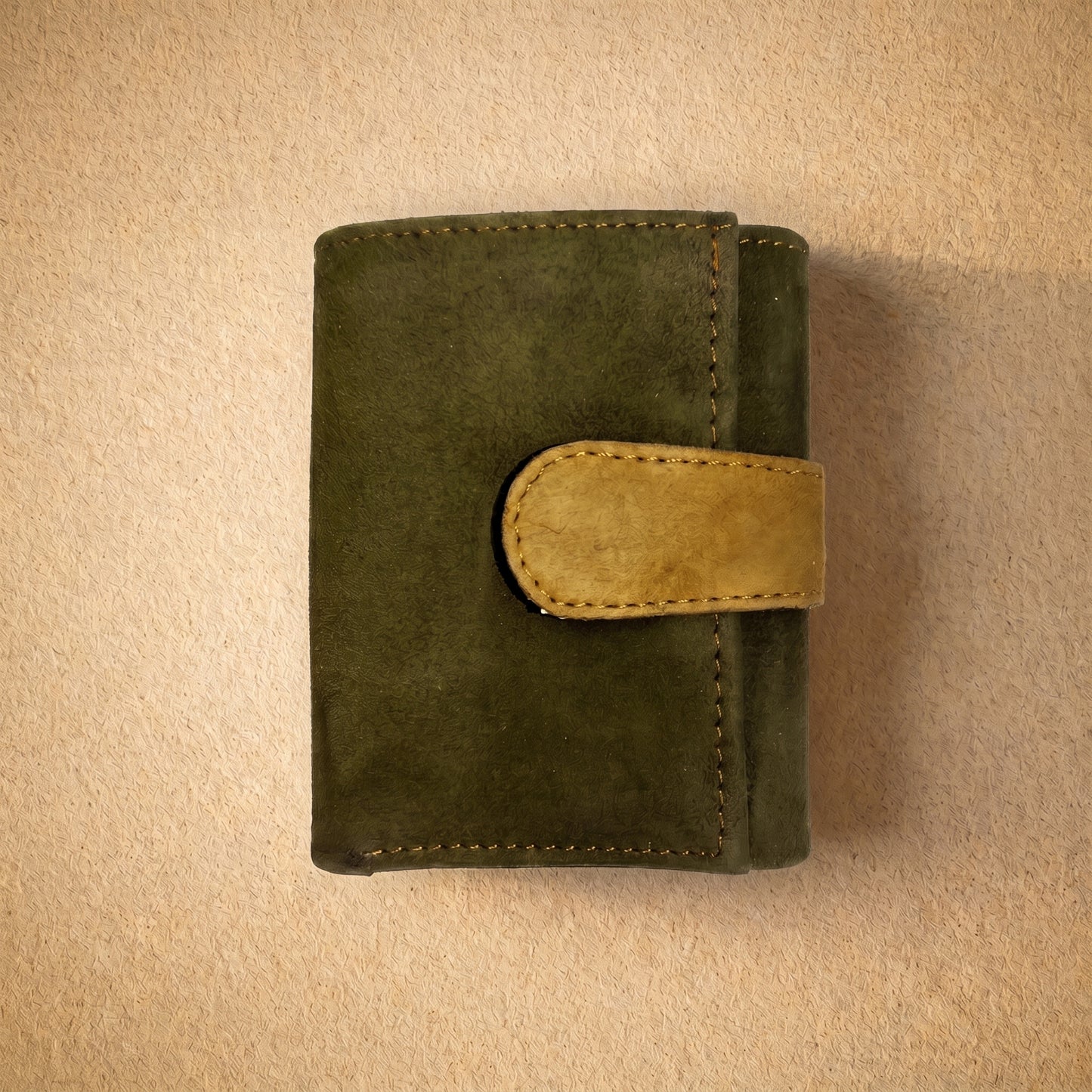 RAQZ Olive Trifold Wallet — handcrafted suede leather from Rajasthan, overhead view