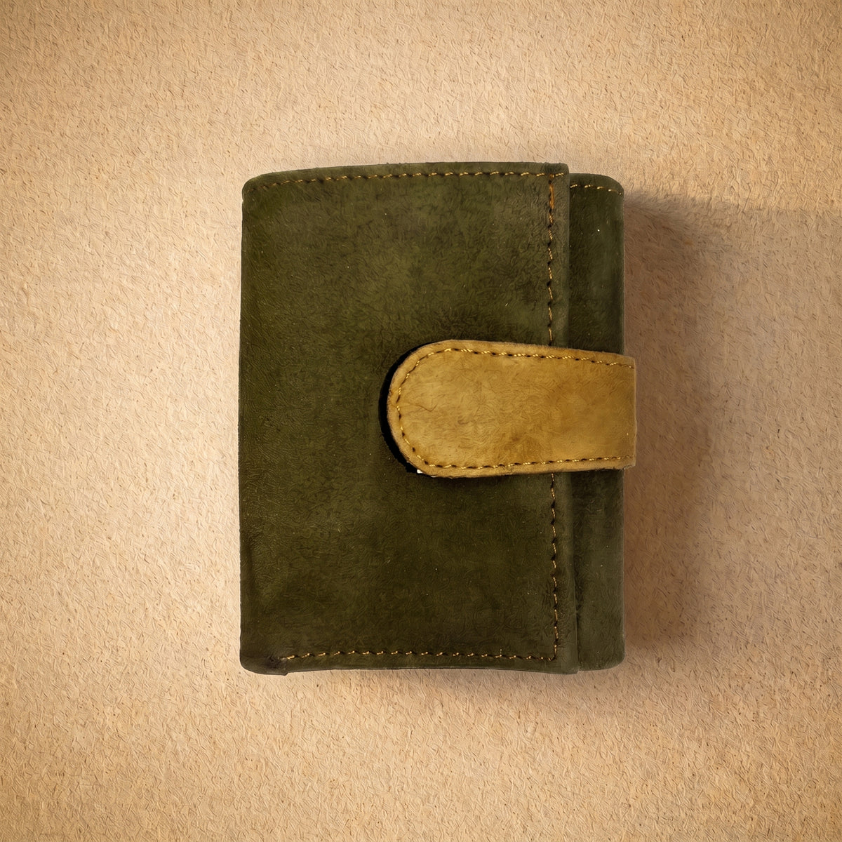 RAQZ Olive Trifold Wallet — handcrafted suede leather from Rajasthan, overhead view